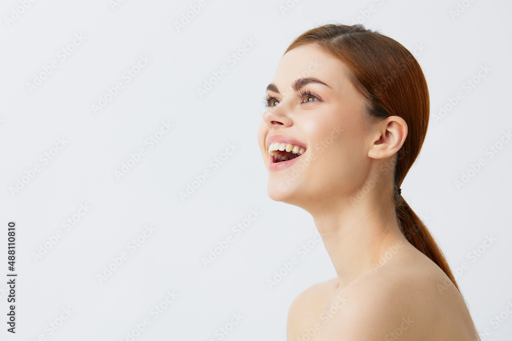 woman red hair bare shoulders cosmetics skincare close-up Lifestyle woman red hair bare shoulders cosmetics skincare close-up Lifestyle