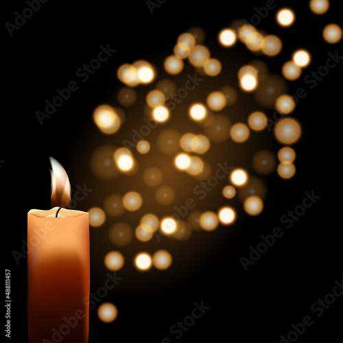 Realistic burning candle on a dark background with bokeh