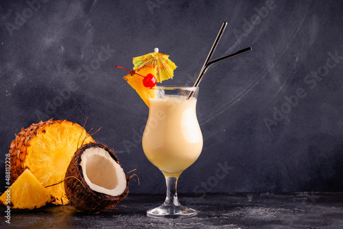 Traditional caribbean cocktail pina colada in a glass.