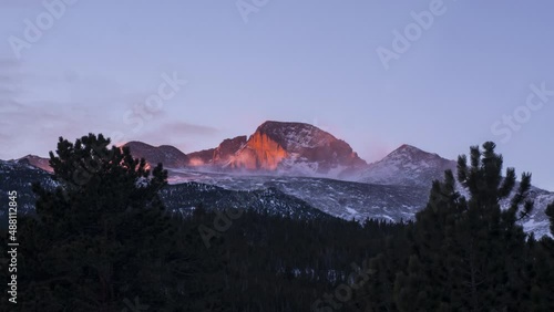 Sunrise over a Snowy and Windy Long's Peak Mountain in Colorado