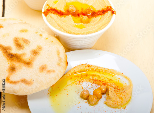 Hummus with pita bread photo