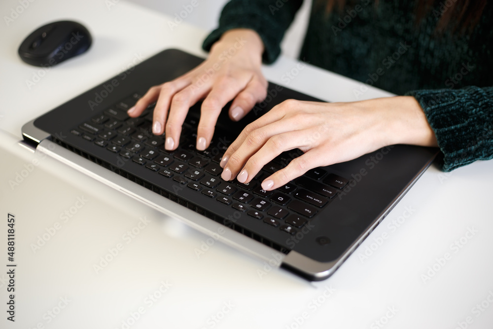 Freelancer woman typing on computer keyboard. Businesswoman working on modern laptop. Hands of white female doing work on notebook pc at home during lockdown Freelancer woman typing on computer keyboard. Businesswoman working on modern laptop. Hands of white female doing work on notebook pc at home during lockdown