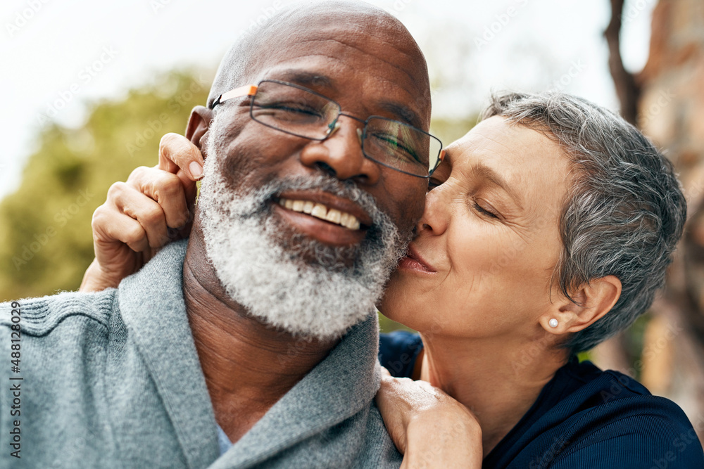 Fototapeta premium Our love grows stronger each day. Shot of a happy senior couple enjoying quality time at the park.