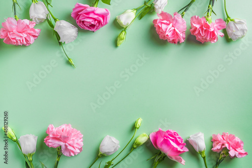 Pink and white flowers frame background