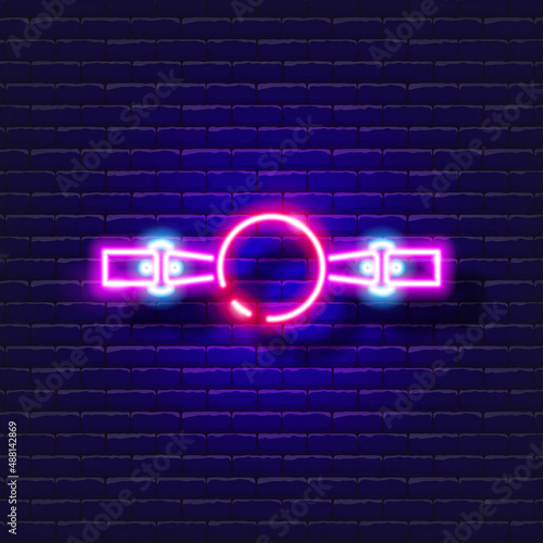 Gag for bdsm neon icon. Sex shop concept. Toys for adults. Gadgets for love. Vector sign for design, website, signboard, banner, advertisement.