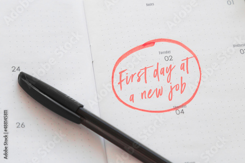Bild auf Leinwand calendar planner with the date highlighted in red the inscription first day on a