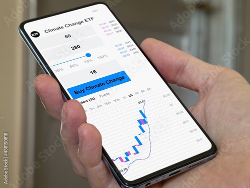 World exchange market etf, carbon ecologic values on smartphone. Business analysis of a exchange-traded fund trend. Invest in international climate change ETF