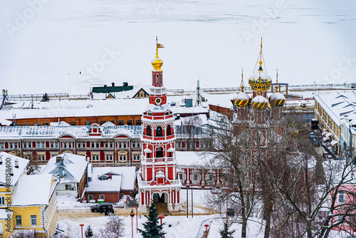 Church of the Cathedral of the Blessed Virgin Mary on Rozhdestvenskaya Street in Nizhny Novgorod. Snow-covered city streets.  photo