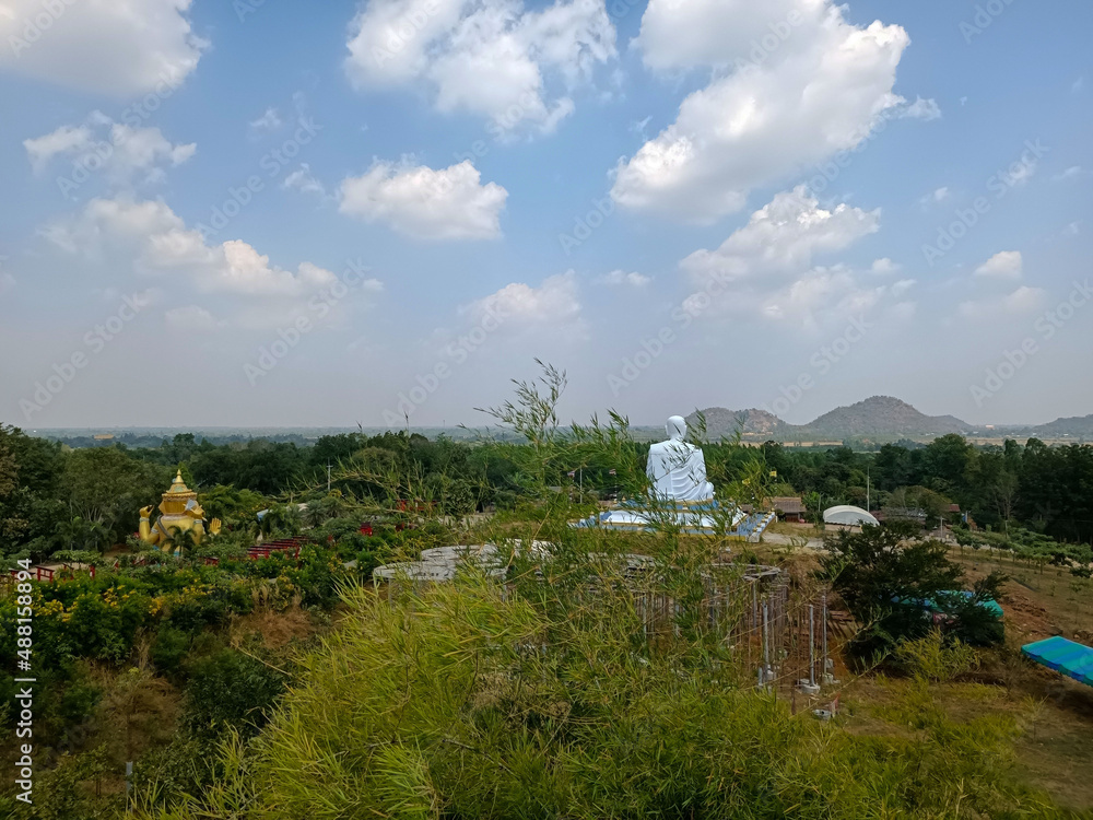 High angle landscape, viewpoint, Buddha image, hill, sky at Khao Sung Chaem Fa Temple:Kanchanaburi Thailand 10February2022