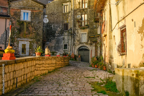 Fototapeta Naklejka Na Ścianę i Meble -  A narrow street in Guardia Sanframondi, a medieval town in the province of Benevento, Italy.