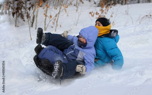 children having fun during winter 