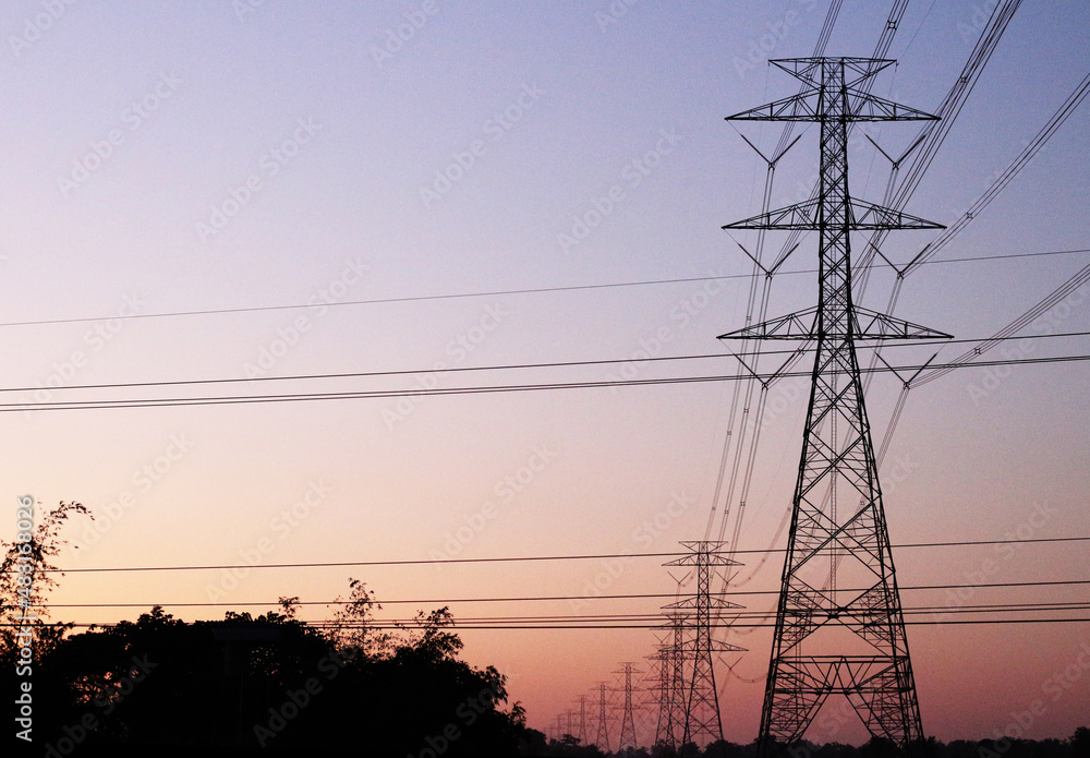 Fototapeta premium Electric poles and the sunset