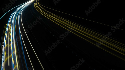 abstract yellow car lights at night. long exposure