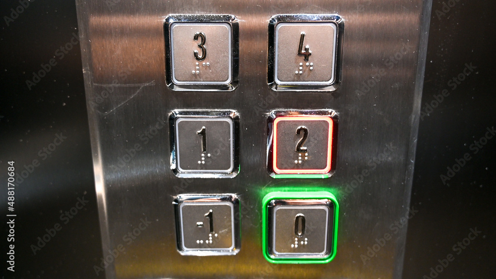 Elevator keypad in building. Floor level buttons, close up. Modern