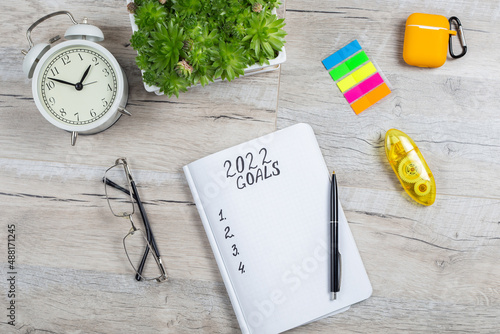 Copy space for 2022 Goals in notebook plan listing of new year goals
