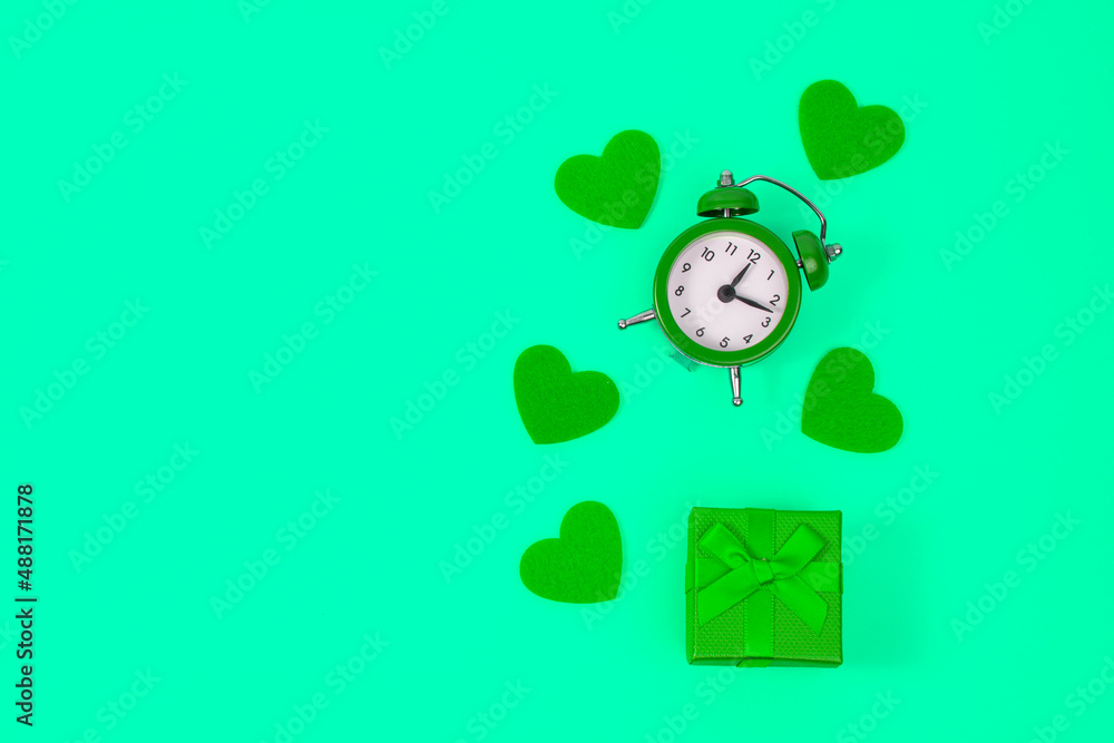 Postcard with felt hearts and alarm clock with copyspace green color saint Patrick day Postcard with felt hearts and alarm clock with copyspace green color saint Patrick day