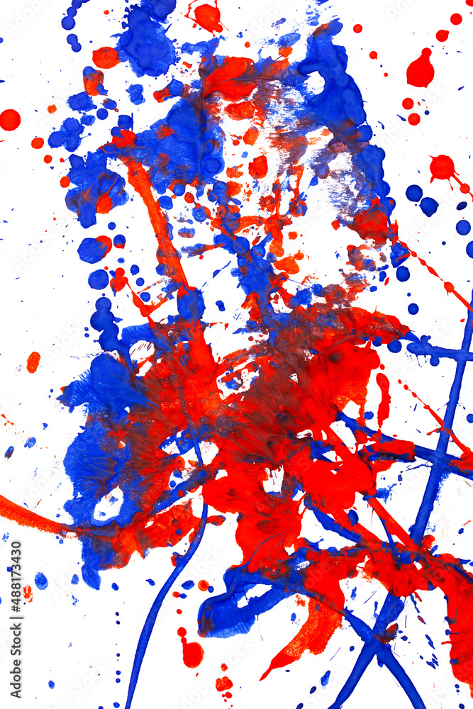 Fototapeta premium Drops of red and blue paint on a white background.