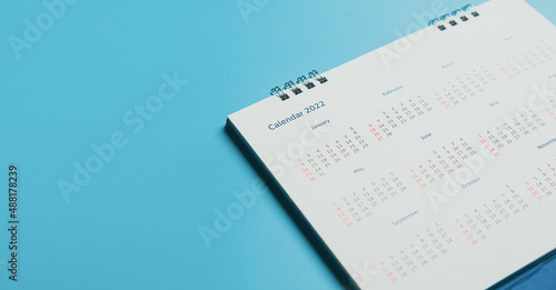 Close top view on white calendar 2022 month schedule Work planning and life concept.