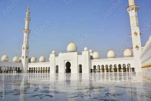 Sheikh Zayed Grand Mosque, courtyard of world's largest mosque located .in Abu Dhabi, in United Arab Emirates; arabesque flower patterns on floor