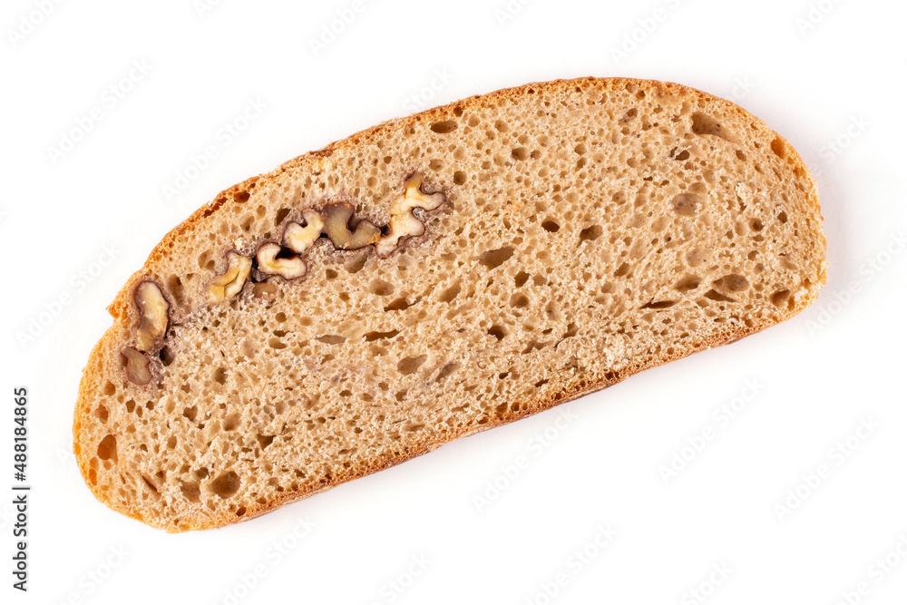 A piece (slice) of healthy round bread made of whole wheat flour with walnuts on a white isolated background. Proper nutrition. Sourdough bread, without yeast. A piece (slice) of healthy round bread made of whole wheat flour with walnuts on a white isolated background. Proper nutrition. Sourdough bread, without yeast.