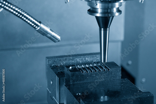 The mold and die manufacturing process by CNC milling machine with ball end mill tool.