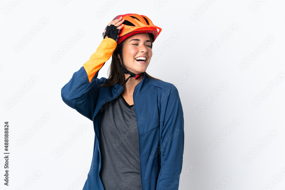 Young cyclist brazilian girl isolated on white  background smiling a lot - obrazy, fototapety, plakaty 