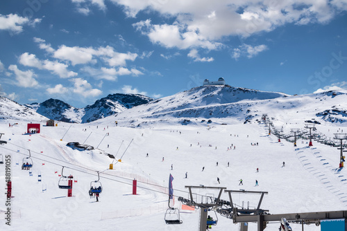 General view of Sierra Nevada, Granada, Andalusia, Spain with the observatory in the background on a sunny day with clouds