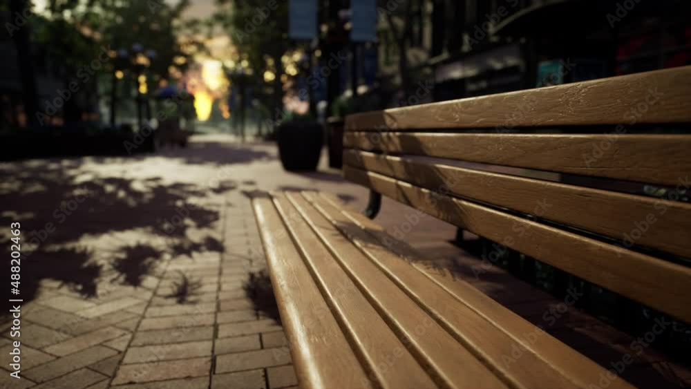 Park bench in downtown on a cloudy afternoon Park bench in downtown on a cloudy afternoon