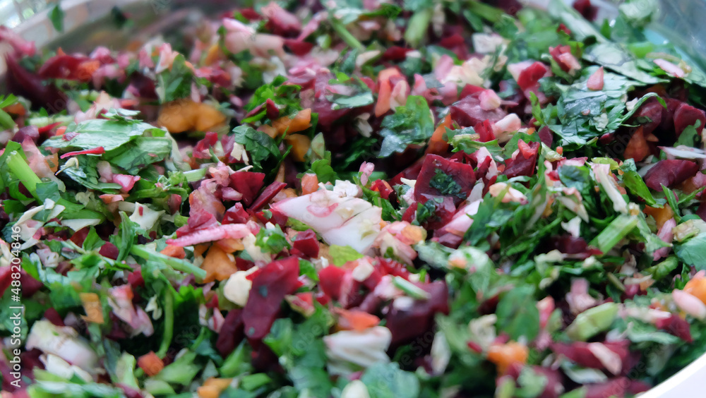 Close up of fresh and raw vegetable chop, with coriander leaves, pak choy, carrot and beetroot. Close up of fresh and raw vegetable chop, with coriander leaves, pak choy, carrot and beetroot.