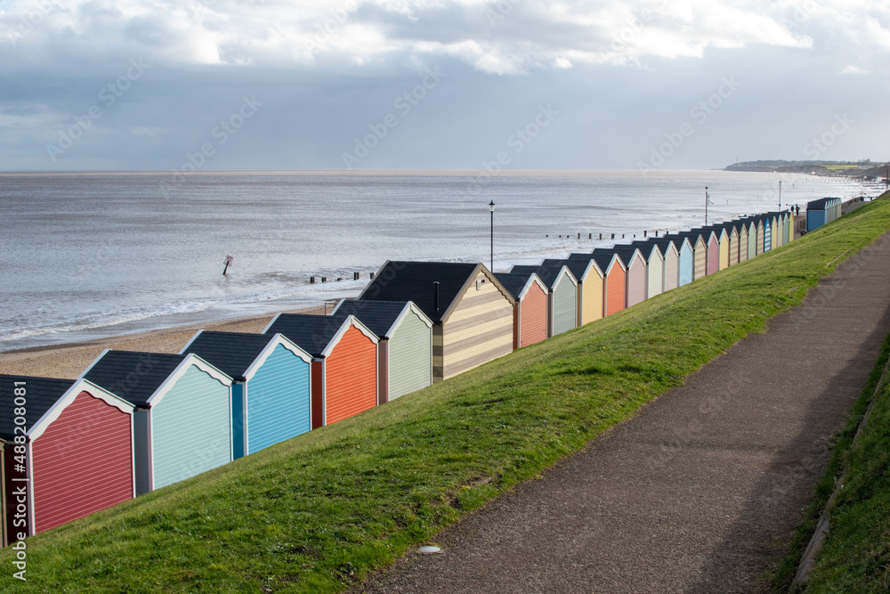 Beach huts on the promenade at Gorleston-on-sea in Norfolk, UK