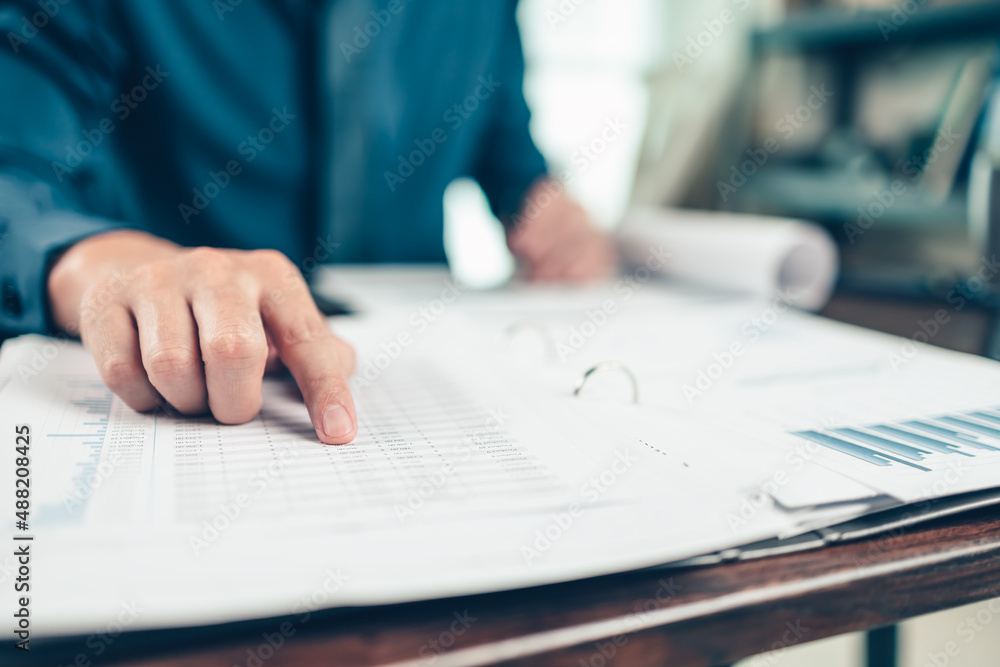 Businessman working on office desk and analyzing new project of accounting finance. Investment, Financial advisor, budget, plan and accounting concept. Businessman working on office desk and analyzing new project of accounting finance. Investment, Financial advisor, budget, plan and accounting concept.