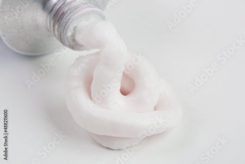 Close up image of ointment tube with squezzed product