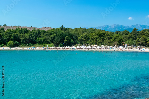 Plavi Horizonti beach landscape. Radovici. Tivat bay. Montenegro. Sandy clearest water beach excellent for kids.