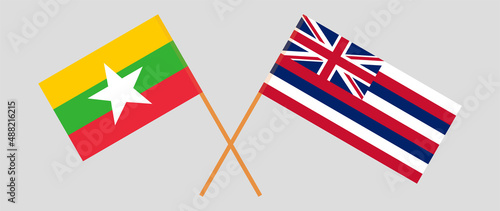Crossed flags of Myanmar and The State Of Hawaii. Official colors. Correct proportion