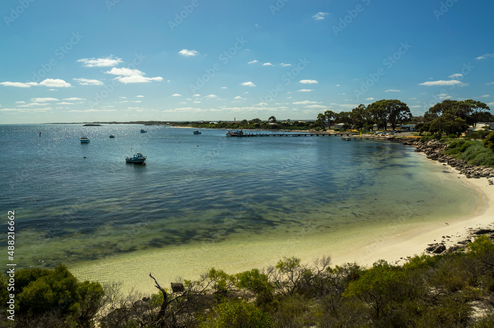 View from a scenic lookout on peaceful Leeman harbor in Western Australia during a sunny day.