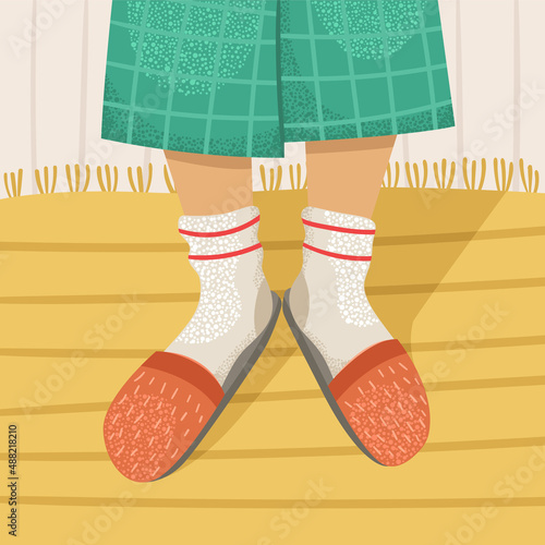 Vector illustration of a man in a terry dressing gown and slippers with socks.
