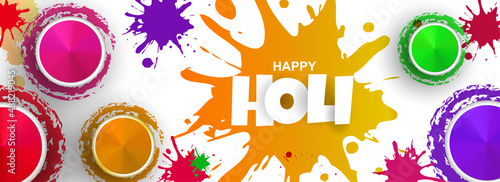 Colorful Holi banner with different dry colros and color splashes on white background