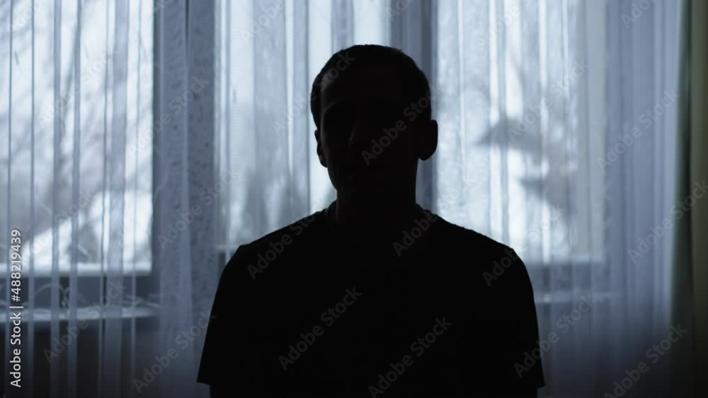 A man gives an anonymous interview A man gives an anonymous interview