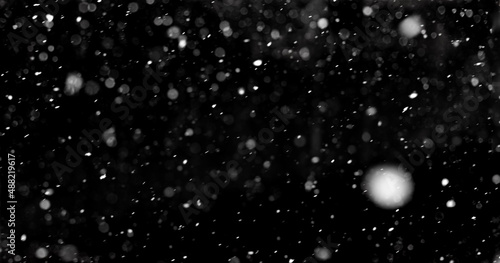 texture Real falling snow on a black background for use in Overlay mode in graphic editor. Adding falling snow to snowfall to your pictures. Banner size