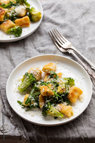 Potato gnocchi with boccoli, rocket and parmesan