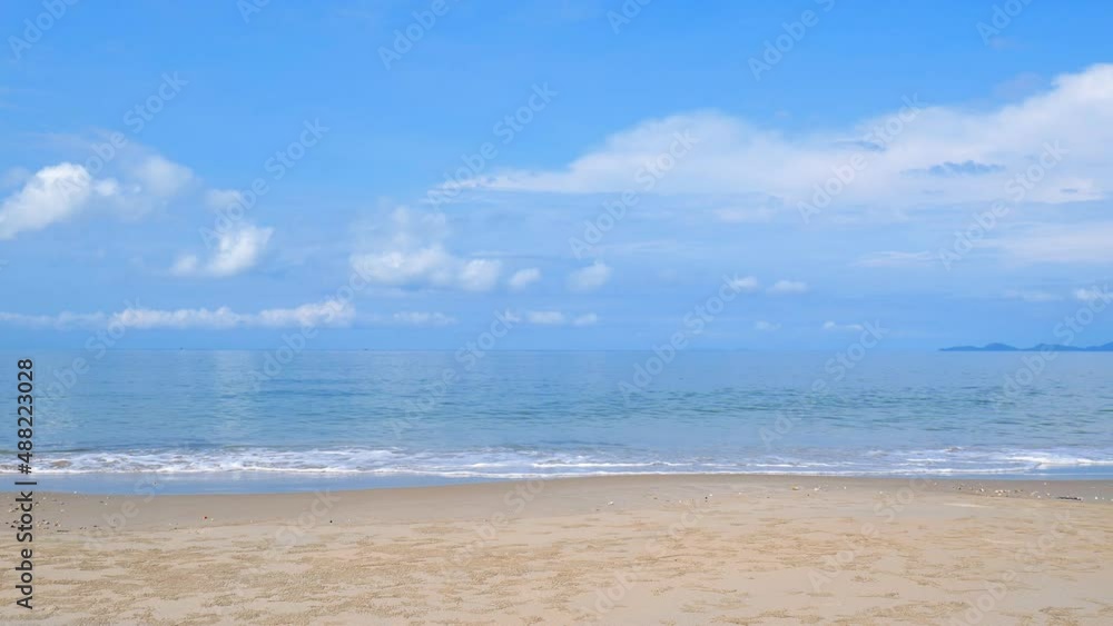 4k video of Serene and beautiful summer beach and blue sky on the Andaman coast in southern Thailand. suitable for tourism and leisure. 4k video of Serene and beautiful summer beach and blue sky on the Andaman coast in southern Thailand. suitable for tourism and leisure.