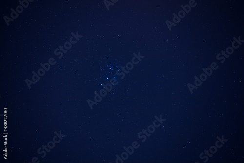 Milky Way stars and starry skies - M45 Pleiades nebula in constellation of Bull.
