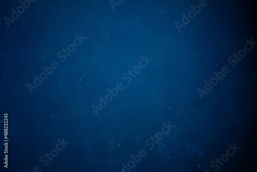 Blue structural background with a spot of light in the center. Board element for inscription and design, copyspace