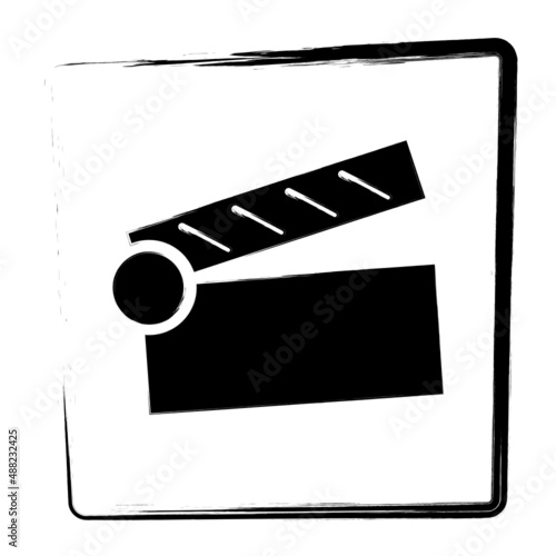 Movie clap icon, framed brush strokes, vector illustration.