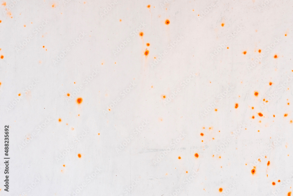 Texture of a metal wall with cracks and scratches which can be used as a background Texture of a metal wall with cracks and scratches which can be used as a background