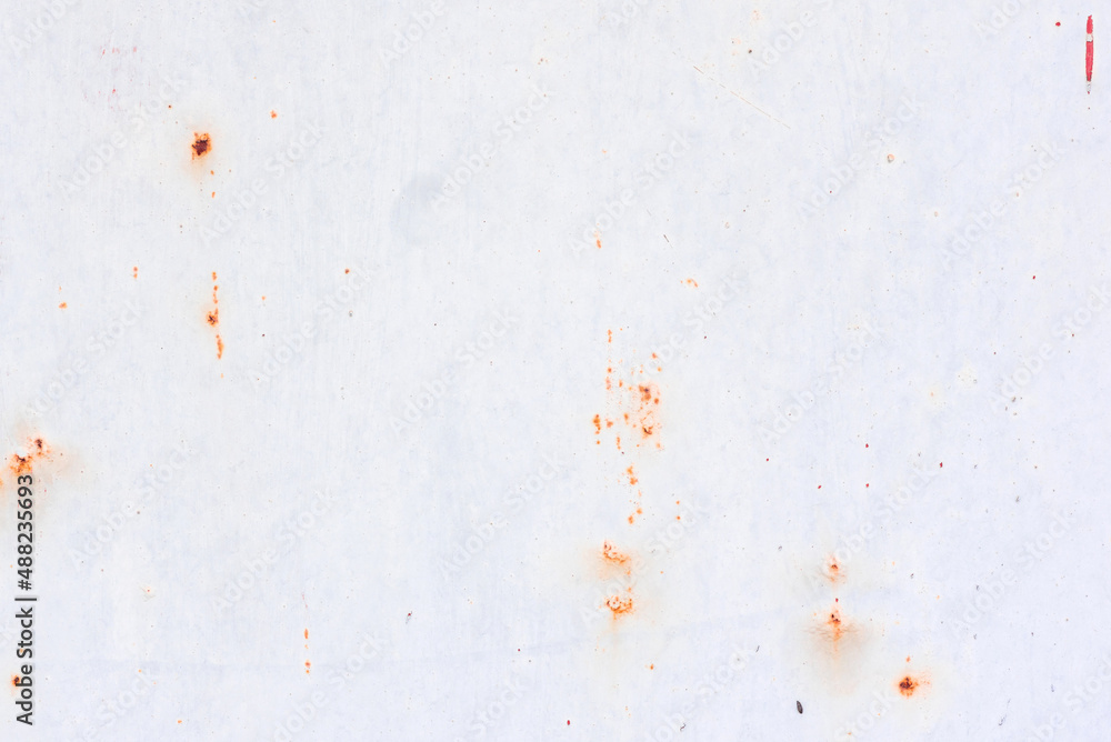 Texture of a metal wall with cracks and scratches which can be used as a background Texture of a metal wall with cracks and scratches which can be used as a background
