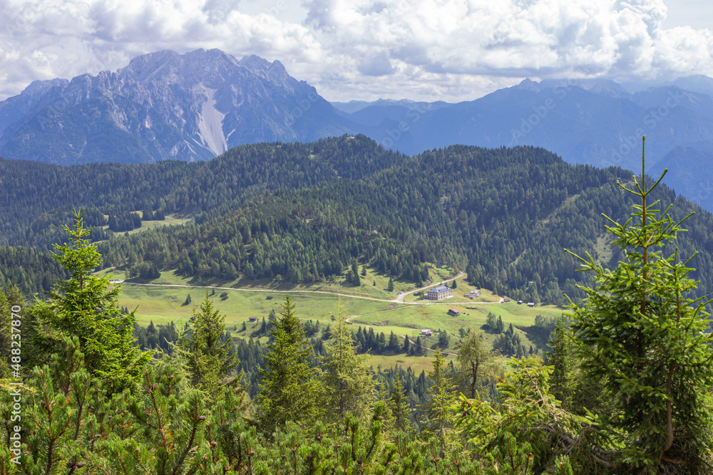Mountain summer landscape. Aerial view of the valley and the eastern Marmarole from the path to Ciareido refuge, Cadore, Italy.
