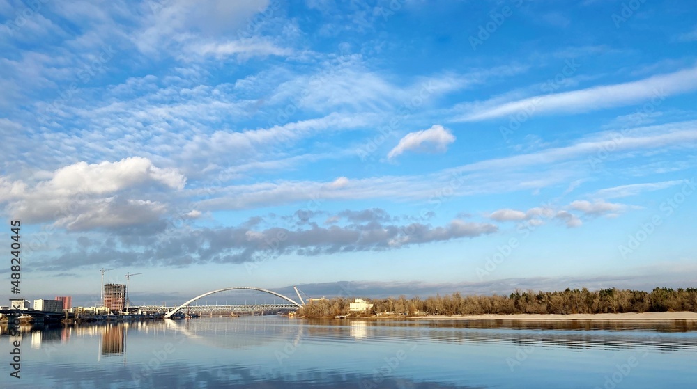 Sky clouds over the Dnieper  river. Scenic cityscape of Kiev, capital of Ukraine. 