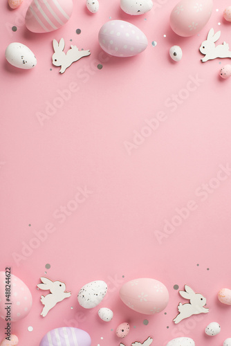 Canvas Print Top view vertical photo of easter decorations shiny confetti easter bunnies lila