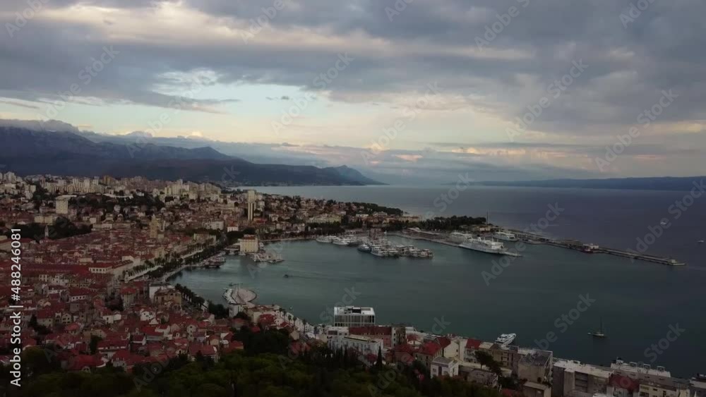 Aerial view of the sea coast and houses in Split. Historical Center, Adriatic Sea and mountains. Yachts in the marina. Dalmatia. Croatia. Europe Aerial view of the sea coast and houses in Split. Historical Center, Adriatic Sea and mountains. Yachts in the marina. Dalmatia. Croatia. Europe